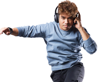 Francis Edwar Guintu with headphones is captured mid-jump, radiating energy and excitement in his expression.