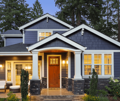 modern, two-story house with navy blue and white accent